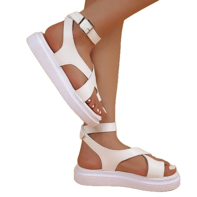 Women's black Roman sandals with buckle fastening and thick composite sole