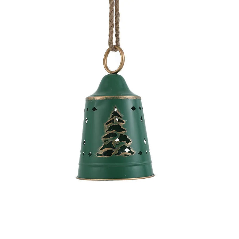 Wrought iron Christmas bell ornament in red, green, and white with hanging loop on a white background