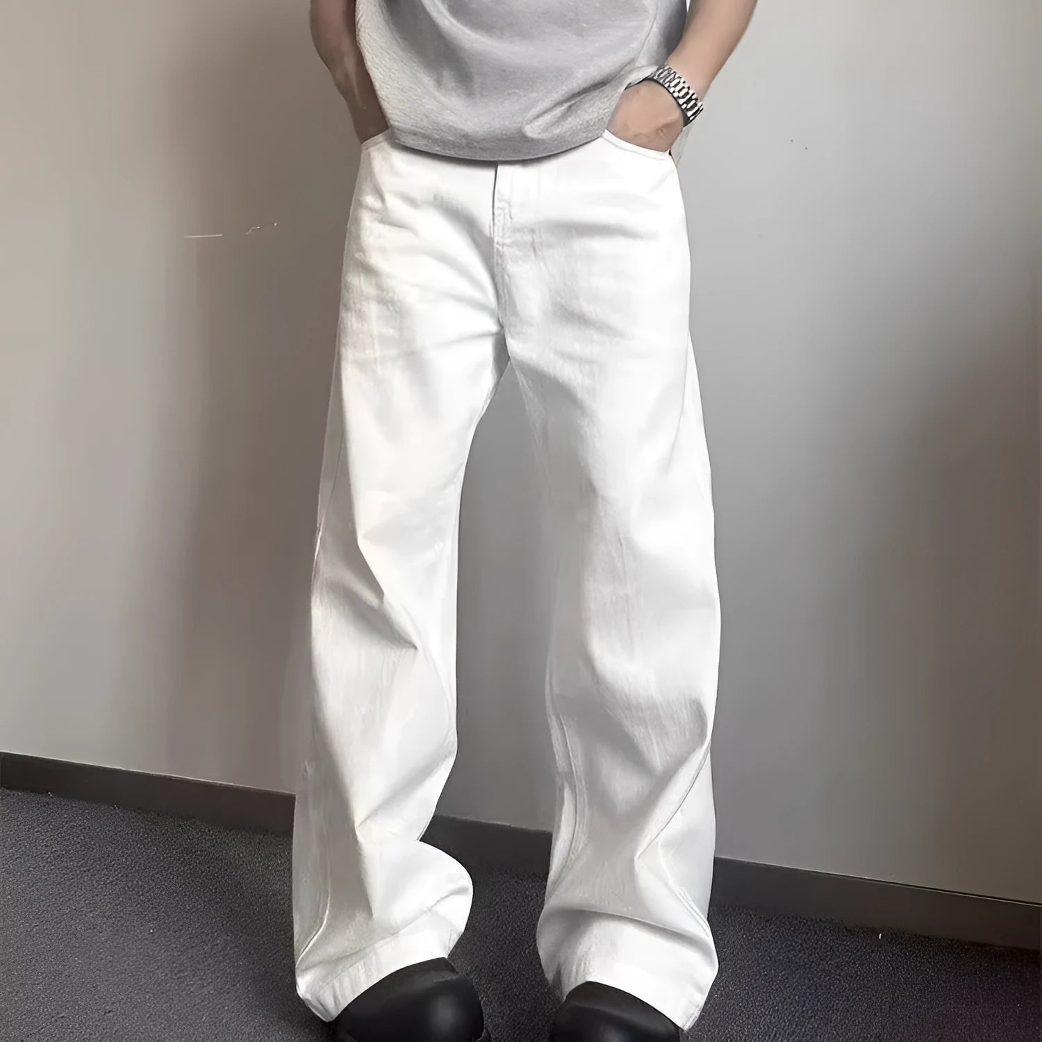 Men's white straight leg jeans with mid-rise waist and zipper fly closure