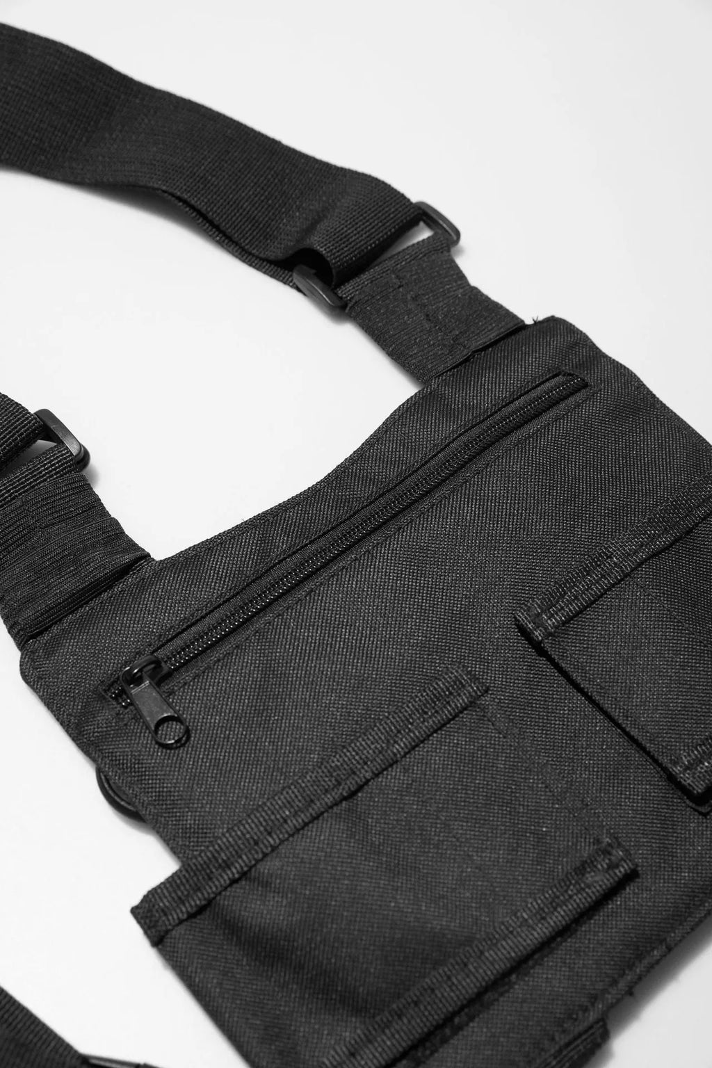Black tactical tooling chest bag for men with striped pattern, Oxford cloth construction for travel use