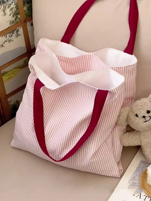 Canvas tote shoulder bag in plaid or striped design with multi-layer compartments