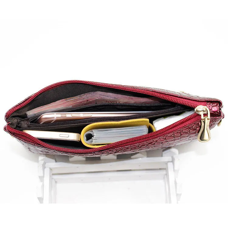 Women's soft PU leather messenger bag in horizontal square design showing black, coffee, and purplish red colour options