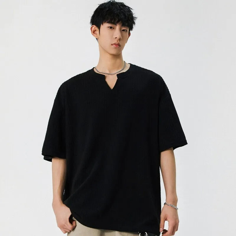 Men's casual loose fit short sleeve V-neck t-shirt in solid beige colour with drop shoulder design