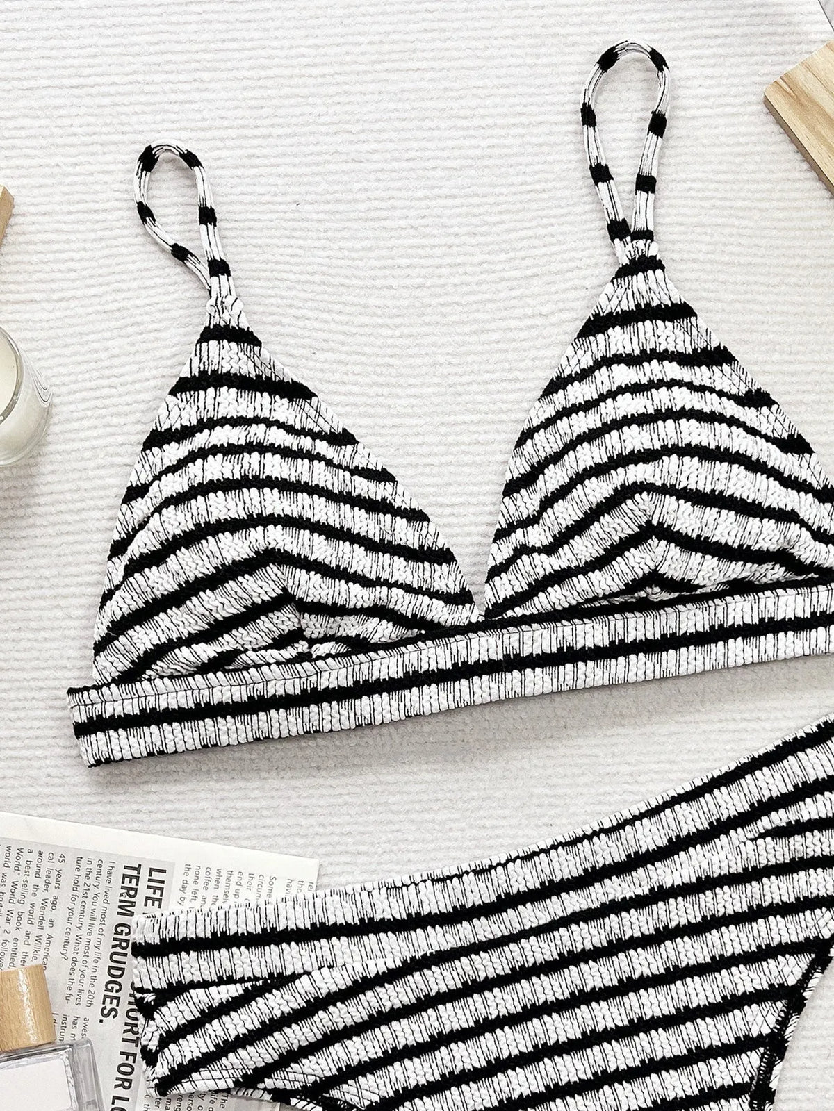 Women's black and white contrast colour separated bikini set with solid pattern and briefs