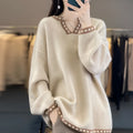 Women's V-neck viscose pullover sweater in camel with long sleeves on plain background