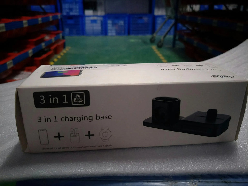 Black silicone 3-in-1 charging station for Apple iPhone, iWatch and AirPods on a desktop