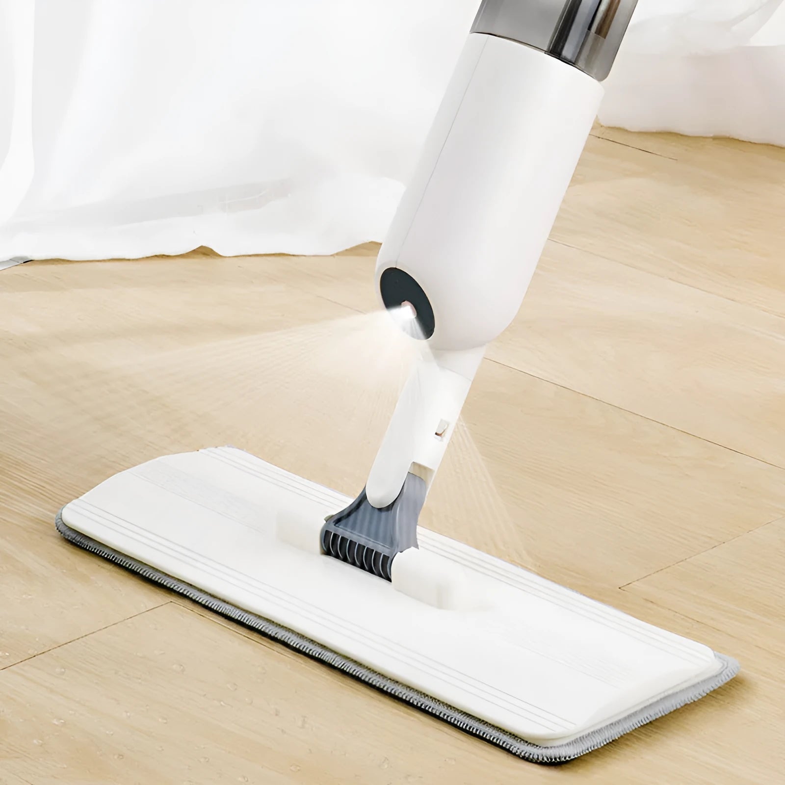 Flat squeeze mop with blue bucket and grey microfiber pad, rotating to show 360-degree head movement.
