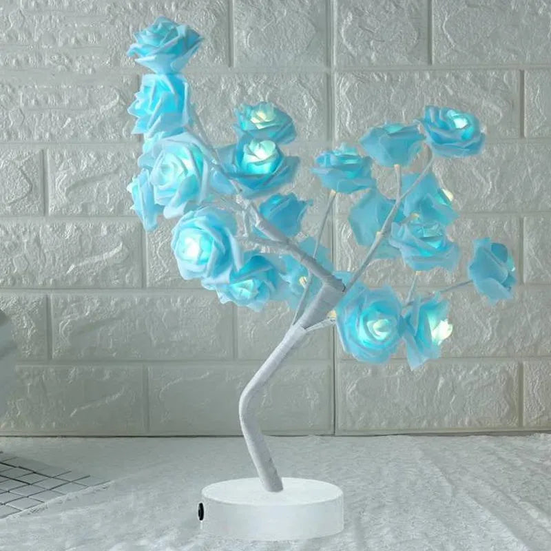 White and red rose flower LED table lamp with bonsai tree lights on a table.