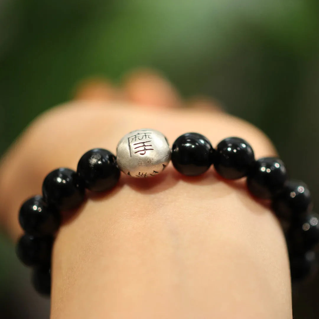 Black agate and sterling silver bracelet with 10mm beads and Chinese style design