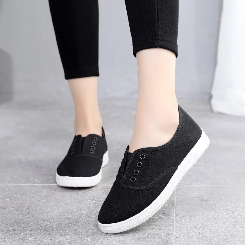 Low-top canvas casual shoes with flat heel and breathable cloth lining in multiple colour options