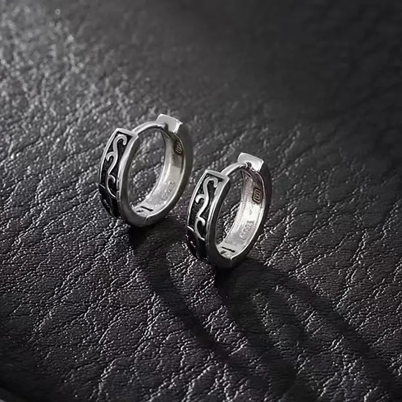 Men's polished copper geometric stud earrings in 10mm and 14mm sizes on a plain background.