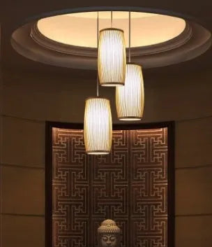 Handmade natural bamboo plait pendant lamp with a 35cm drop for hall or staircase lighting.