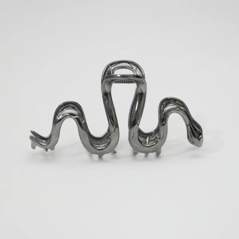 Silver Slytherin serpentine snake design metal hair barrette measuring 10.5cm.