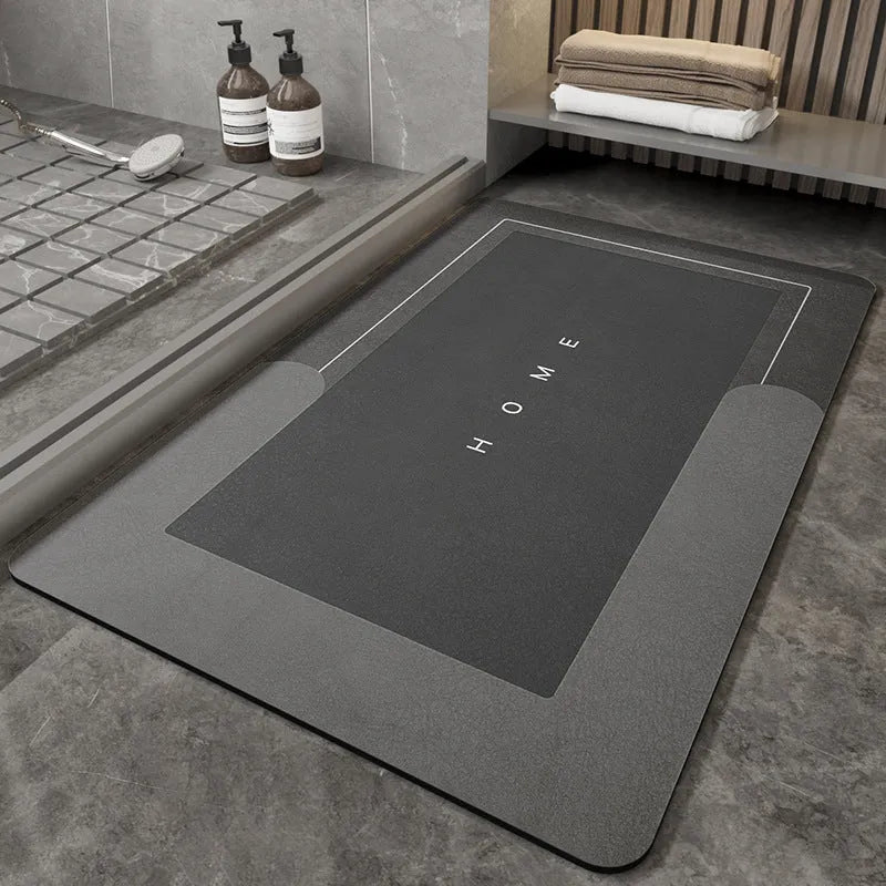 Blended fabric bathroom floor mat in blue, available in oval and rectangular shapes.