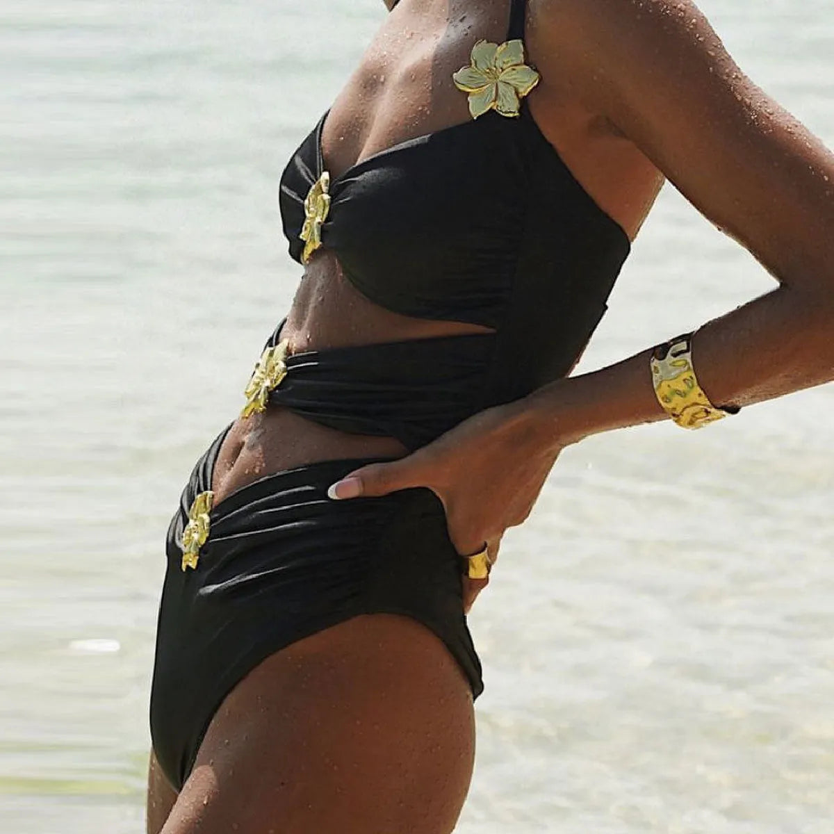 Solid colour one-piece swimsuit with matching short skirt, hollow-out tube top, black variant