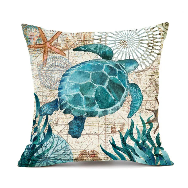 Square linen cushion cover with a detailed blue and green sea turtle print, showing the invisible zipper closure.