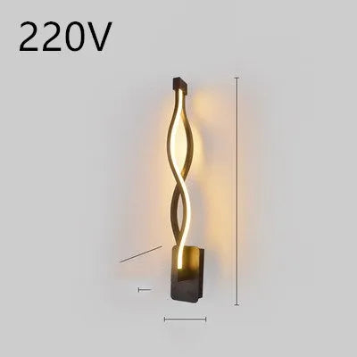 Minimalist Nordic design LED wall lamp with a silicone shade, mounted on a bedroom wall.