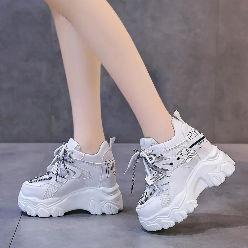 White women's mesh platform sports shoes with cross strap and a 6-8cm rubber sole.