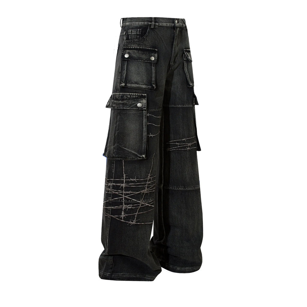 Black men's cotton wide-leg loose-fit trousers with embroidery on a mannequin.