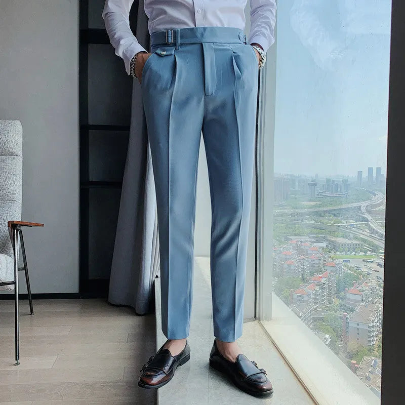 Men's straight-leg casual trousers in solid colours including black, gray, and khaki.