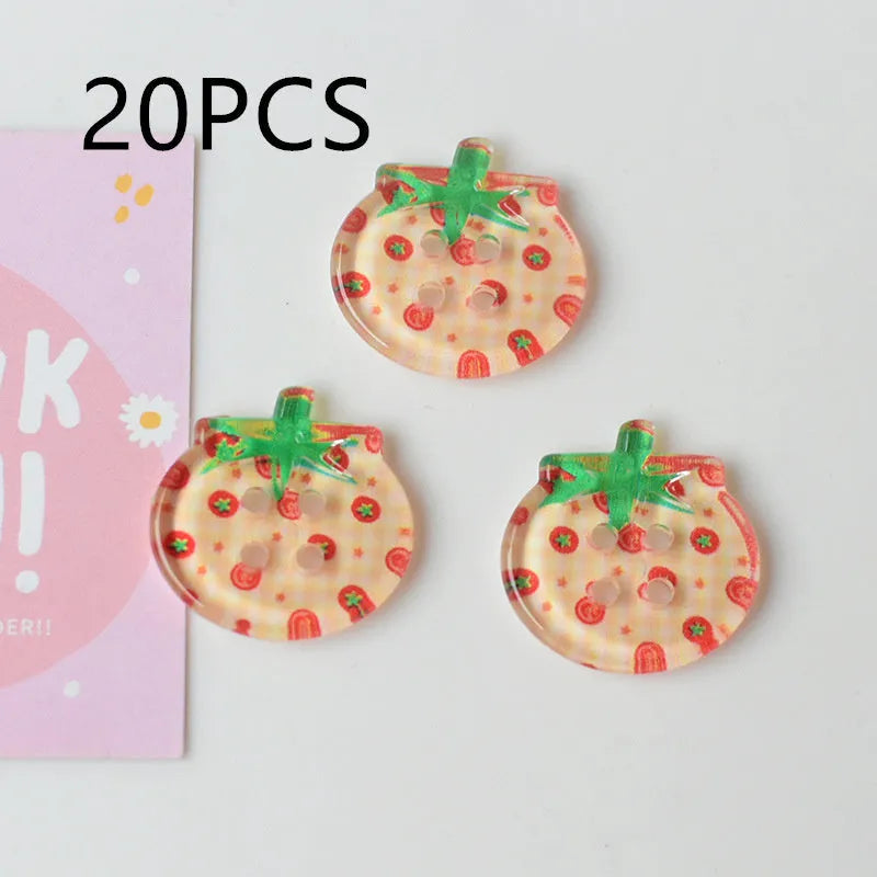 Plastic tomato button ornaments in cherry tomato printing, red plaid, solid red, and mixed colour designs