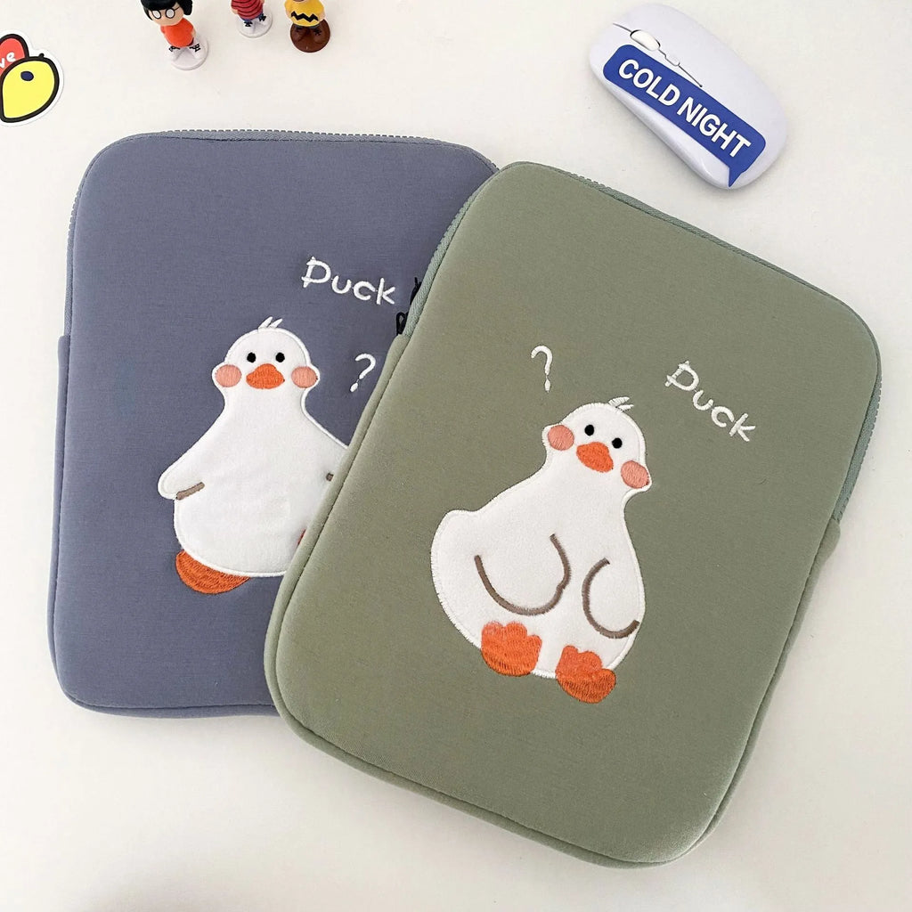 Blue cotton tablet case with cartoon duck embroidery and a zipper closure.