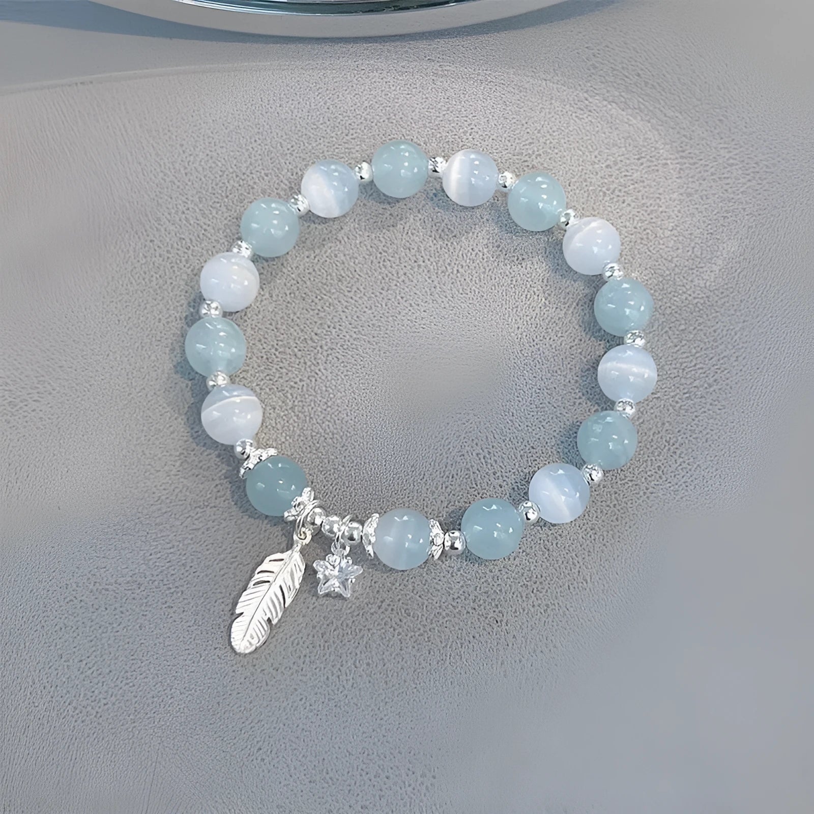 Small white crystal bracelet with eight star design in blue moonlight colour