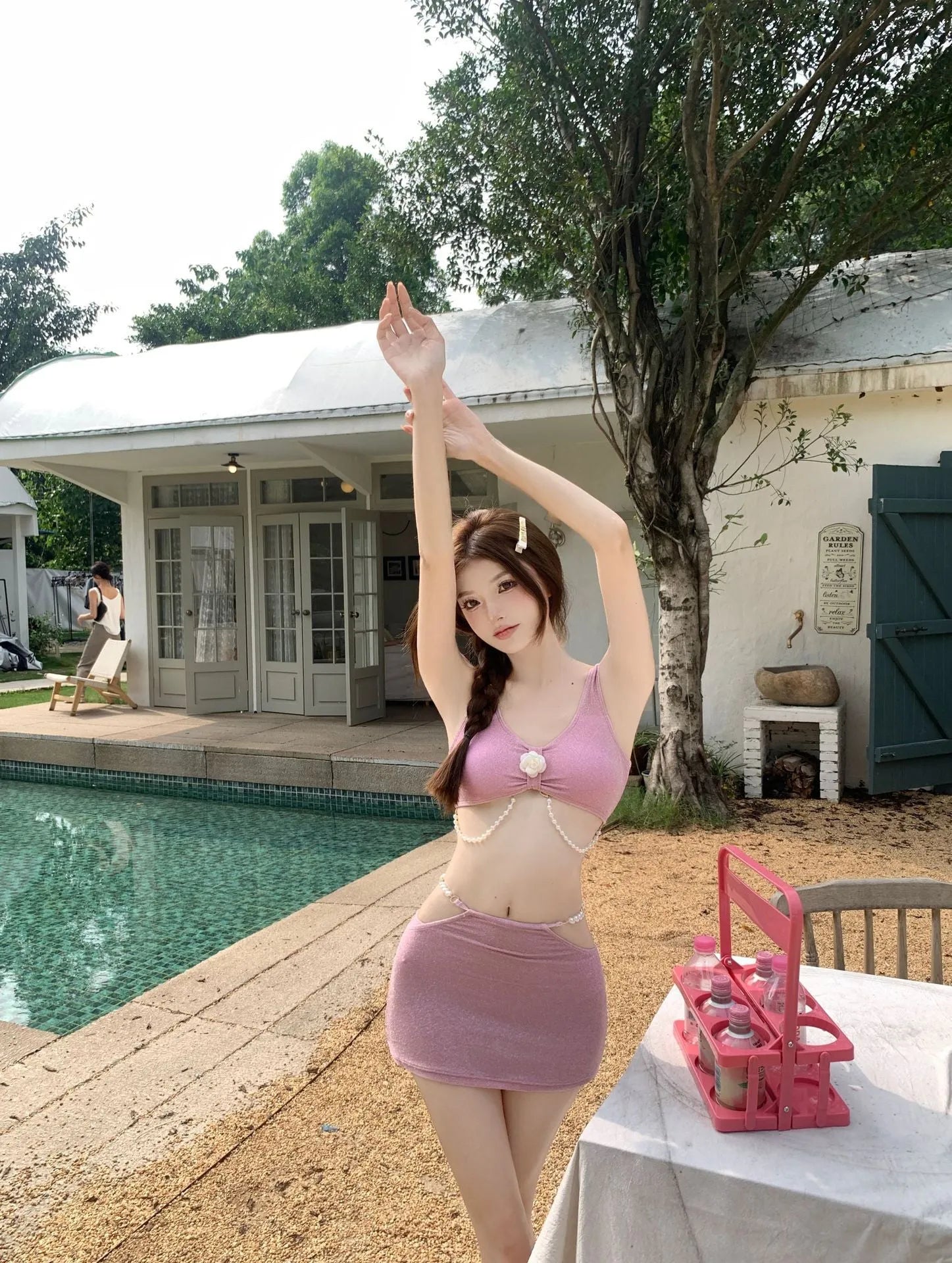 Bear Vacation women's three-piece bikini set in pink or black for swimming and hot springs.