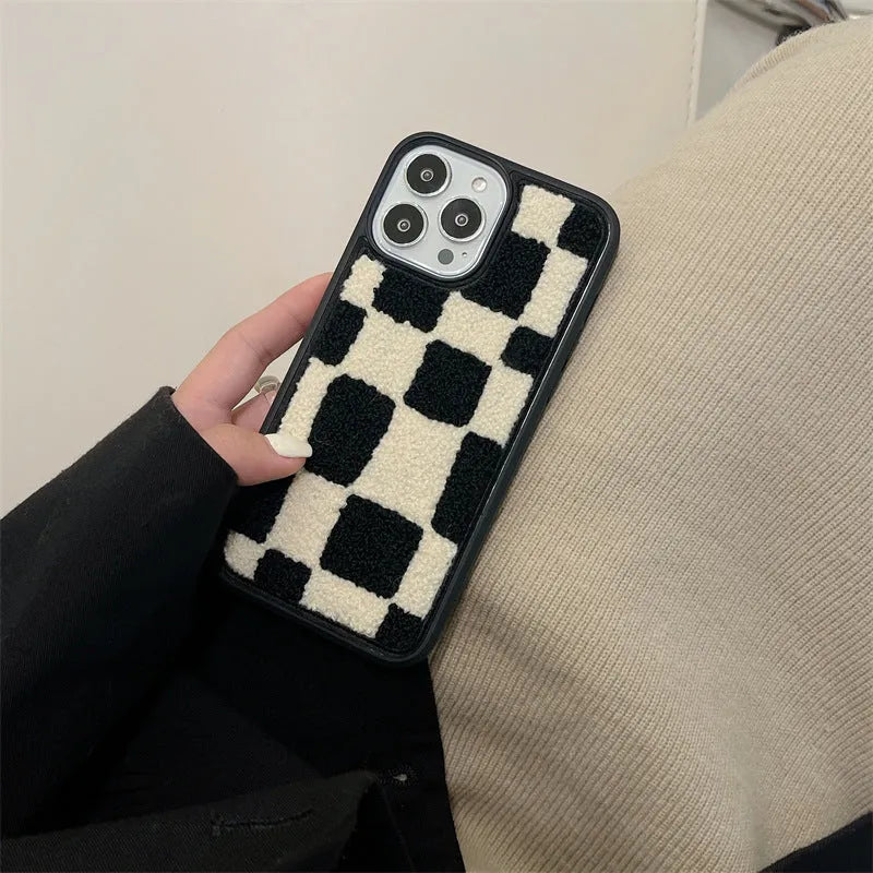Black and white lattice silicone back cover for Apple iPhone models, including iPhone 14 and iPhone 13