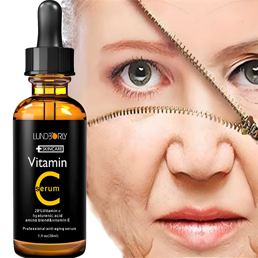 Vitamin C serum set with two 30ml bottles and a white facial beauty device on a clean surface