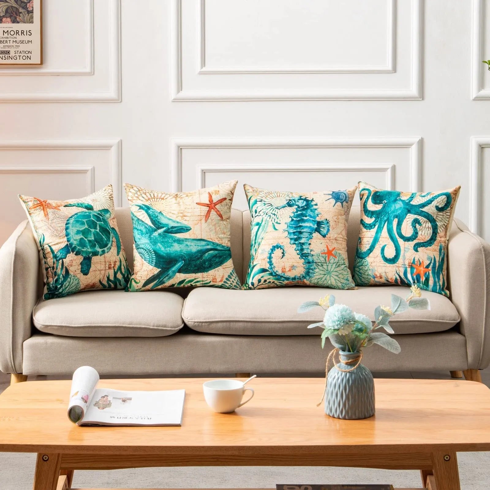Square linen cushion cover with a detailed blue and green sea turtle print, showing the invisible zipper closure.