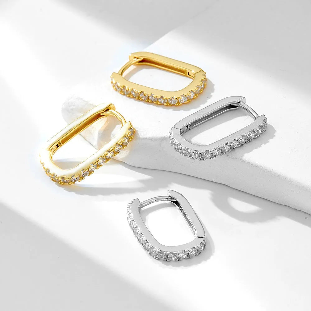S925 sterling silver oval zircon ear clips with geometric design in white finish