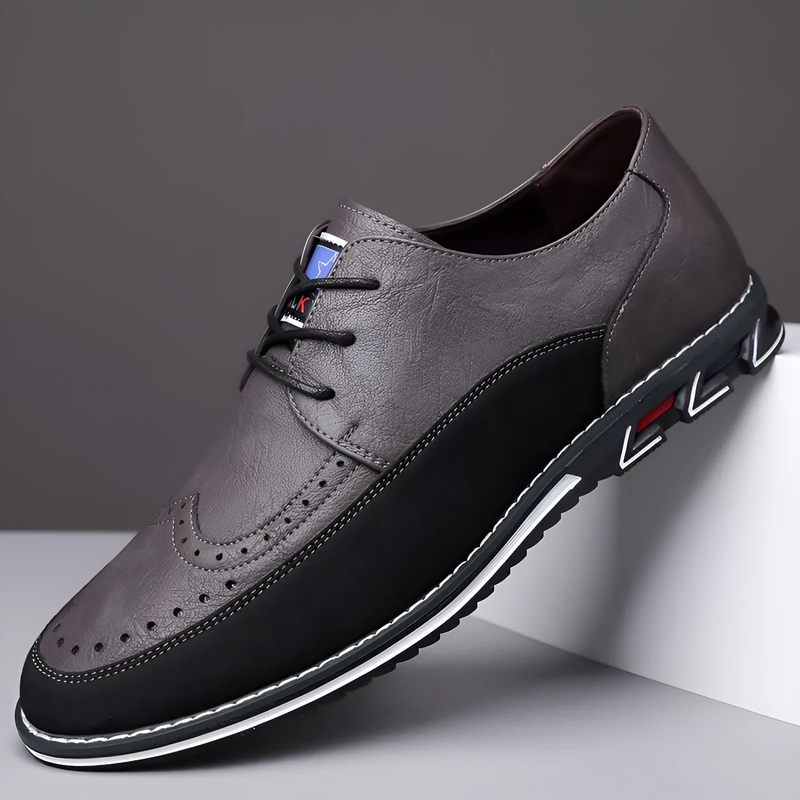 Men's black leather slip-on loafer shoe with a rubber sole and visible stitching detail