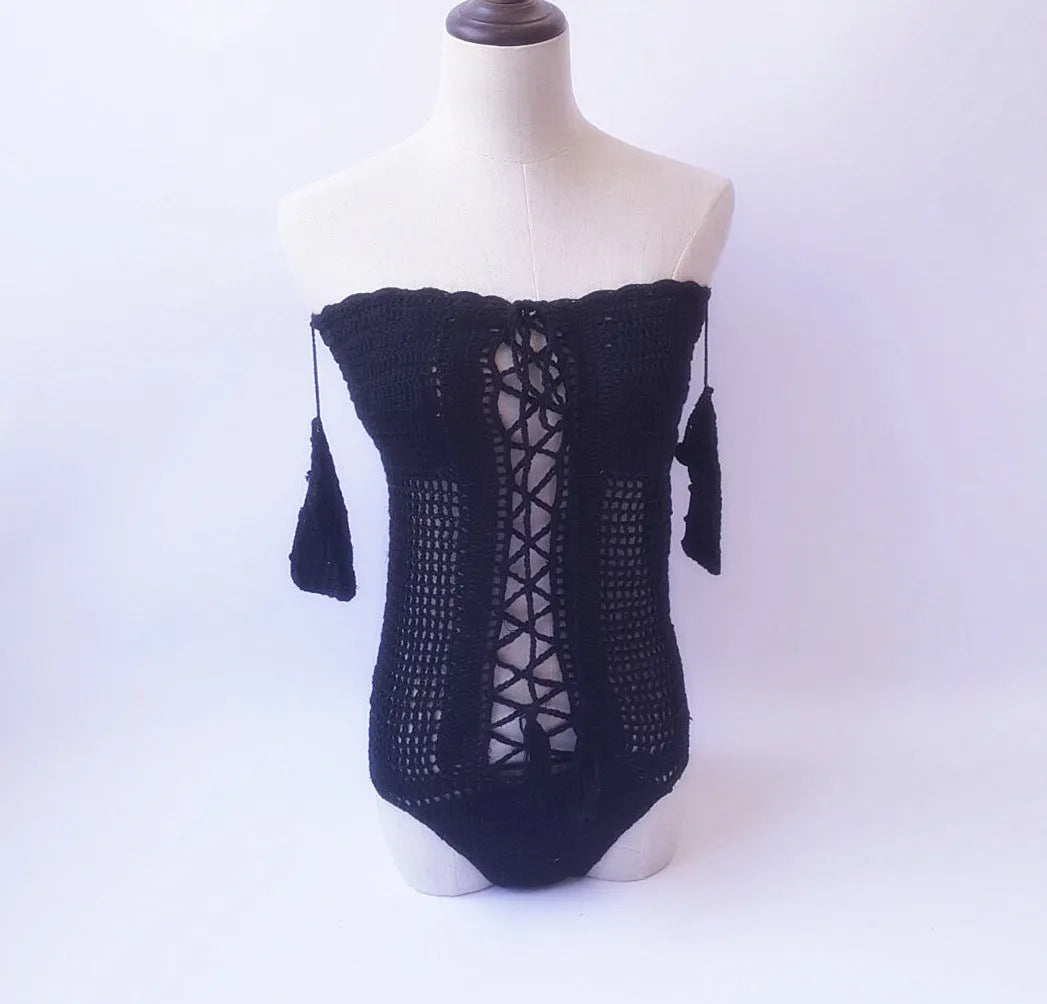 Off-shoulder one-piece swimsuit in light pink on a mannequin
