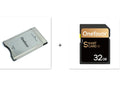 Mercedes-Benz SD to PCMCIA adapter card with stainless steel housing and inserted 32GB SDHC memory card.