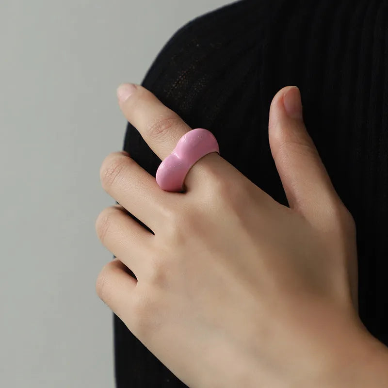 Three-dimensional enamel heart ring in zinc alloy showing raised design detail