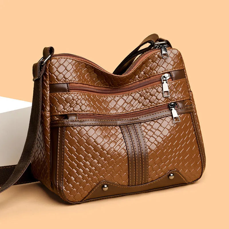 Brown PU leather messenger bag with multiple compartments and single shoulder strap