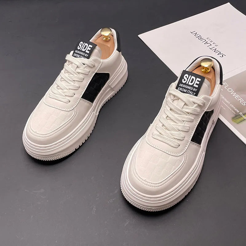 White, green and black sports casual shoes with cloth upper and rubber foam sole showing heel lift insert option