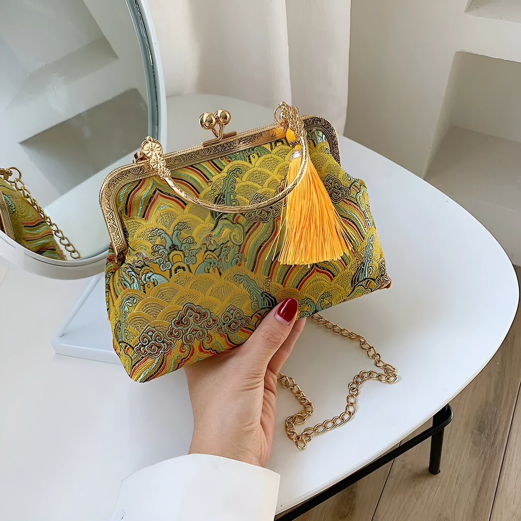 Chinese embroidery cheongsam handbag in polyester with shell shape and internal zipper compartment