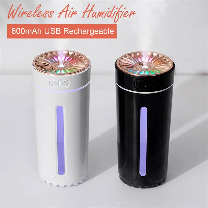 Portable black USB humidifier with colourful lights on car cup holder