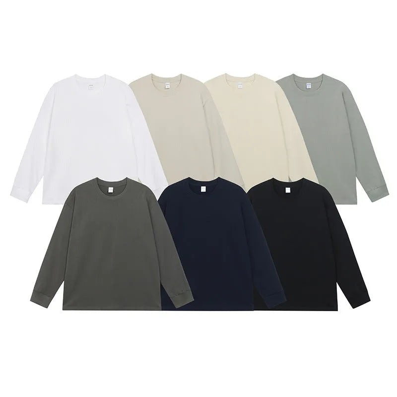 Men's loose fit solid colour cotton long-sleeved T-shirt on a hanger.
