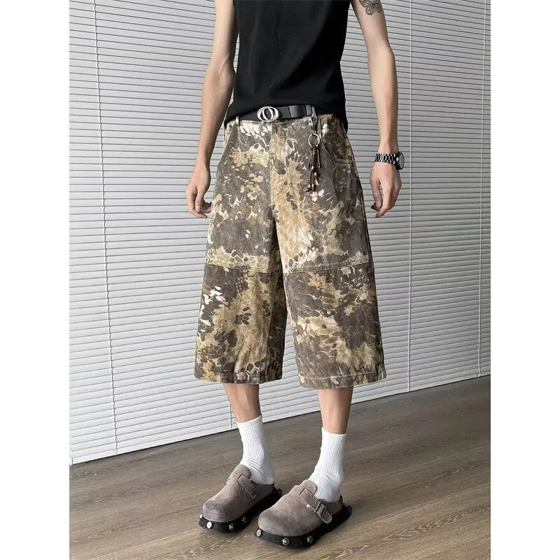 Yellow snake pattern camouflage cropped jeans in cotton denim.