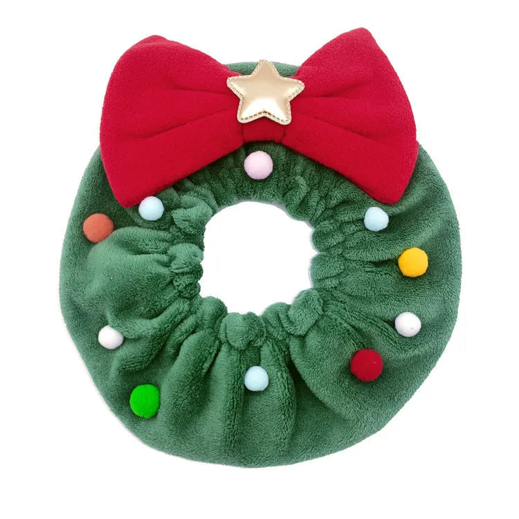 Green Christmas pet bow-knot collar with colourful fuzzy balls on a cat or dog for festive photo props