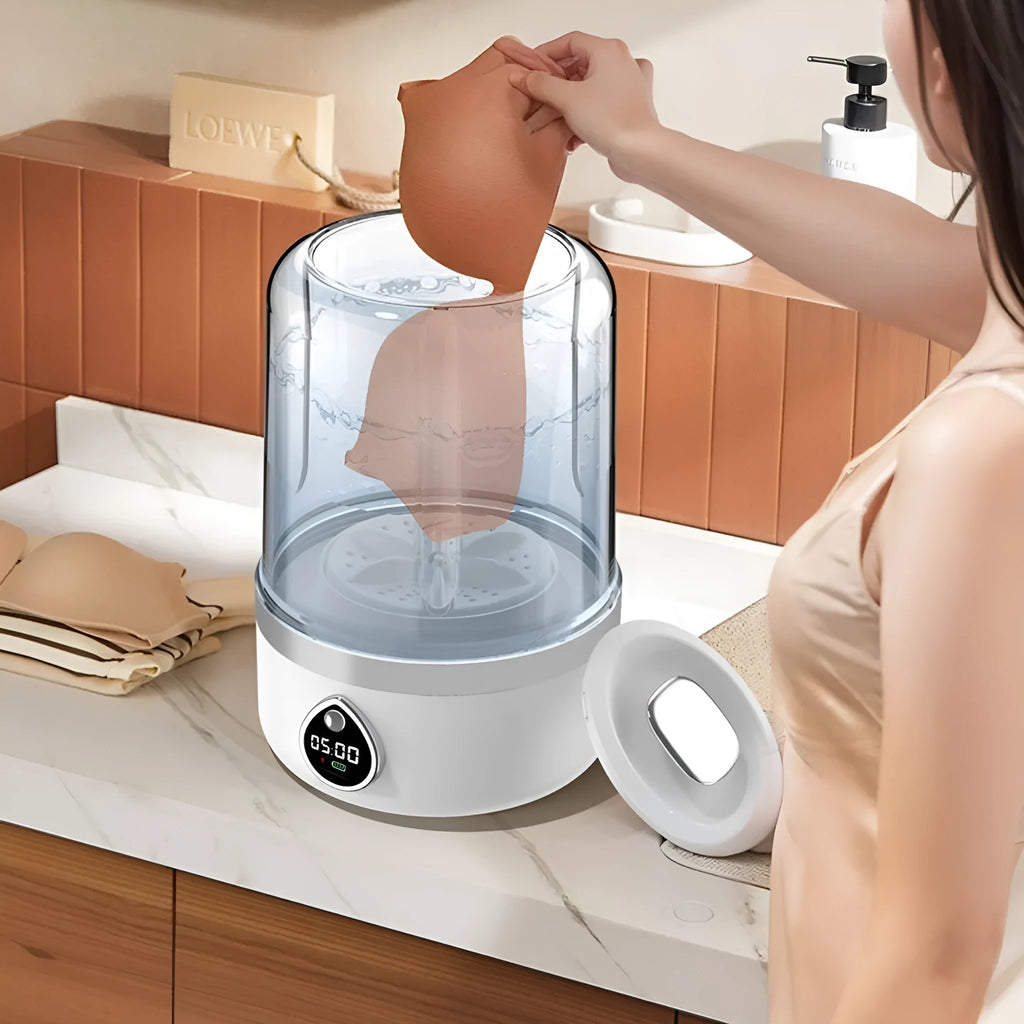 Portable household USB charging automatic mini washing machine in white plastic, 13.5cm wide.