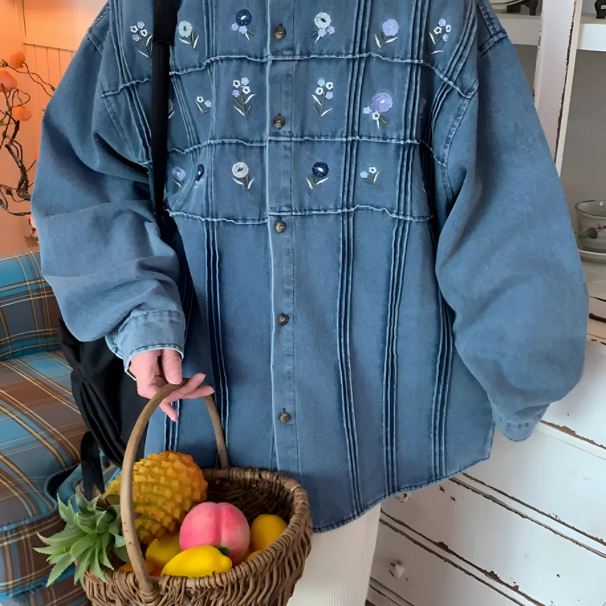 Vintage washed blue denim shirt with small floral print and pleated front on long sleeves