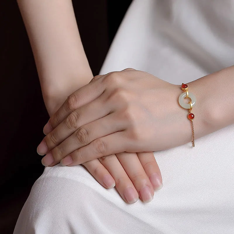 Sterling silver adjustable bracelet with Hetian jade peace buckle charm