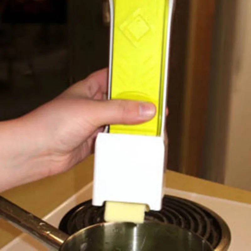 Yellow plastic butter cutter with stainless steel blade for quarter-pound butter bars