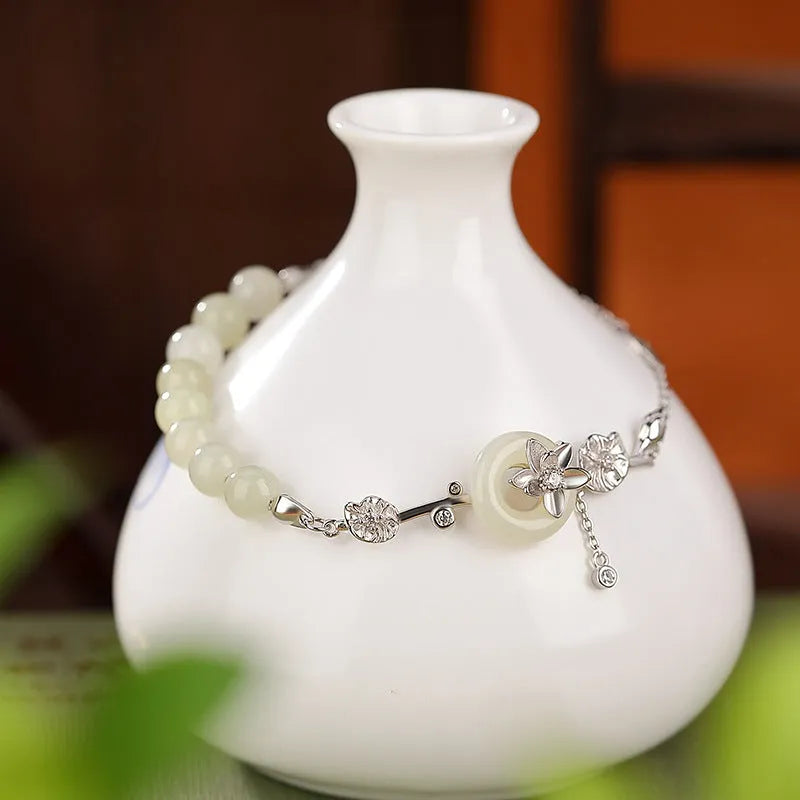 925 silver lotus peace buckle bracelet with Hetian jade inlay on wrist