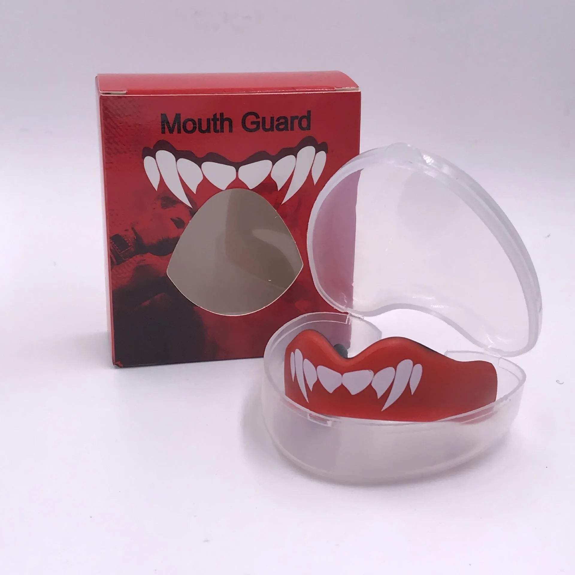Adult boxing mouthguard with tooth socket design in black and white printed teeth graphic