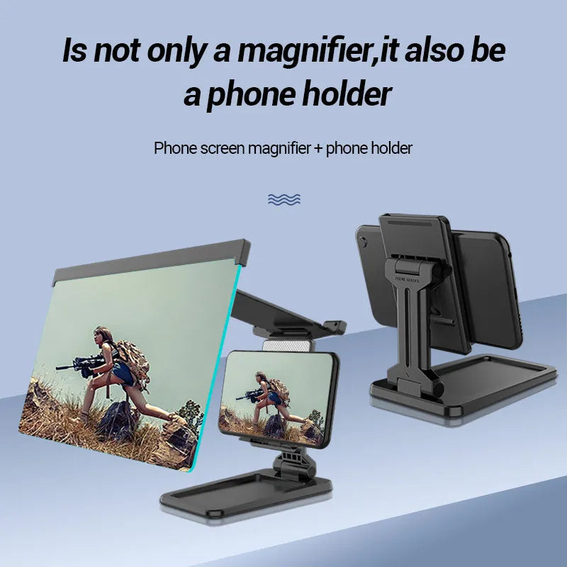 Black foldable mobile phone screen amplifier with detachable holder on a desk